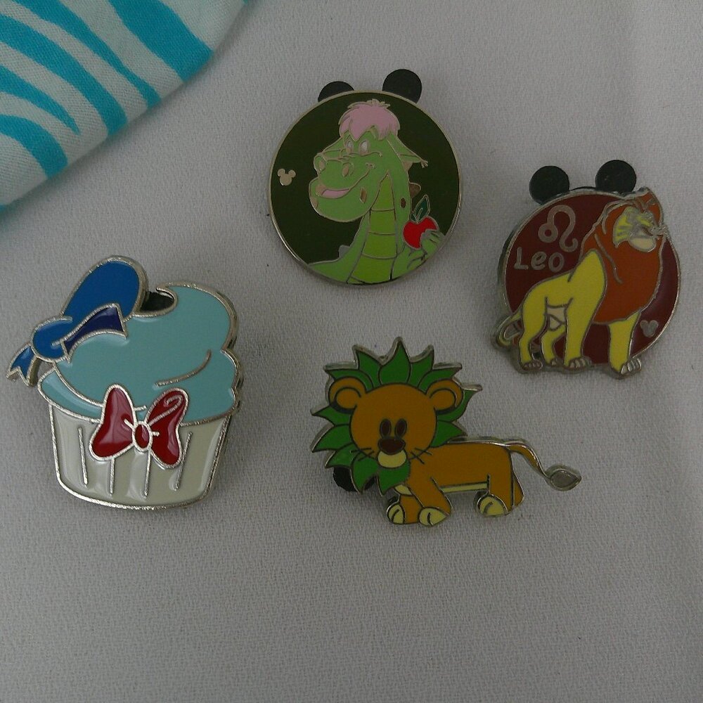 Four Walt Disney World Trading Pins